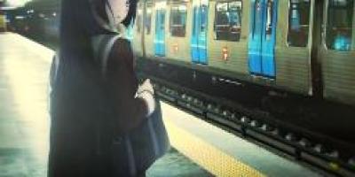 girl waiting to hook up on train
